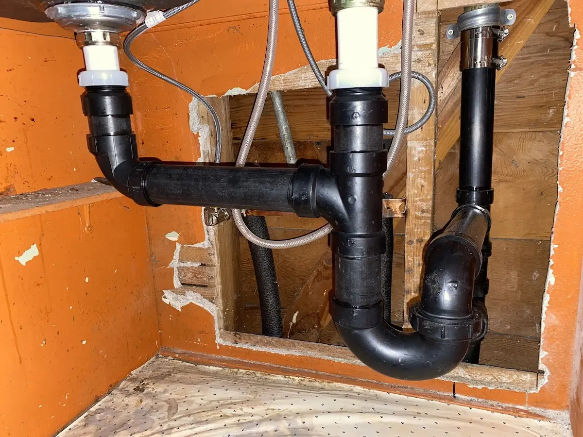 Professional Garbage Disposal Repair equipment and tools on the job in Burtonsville